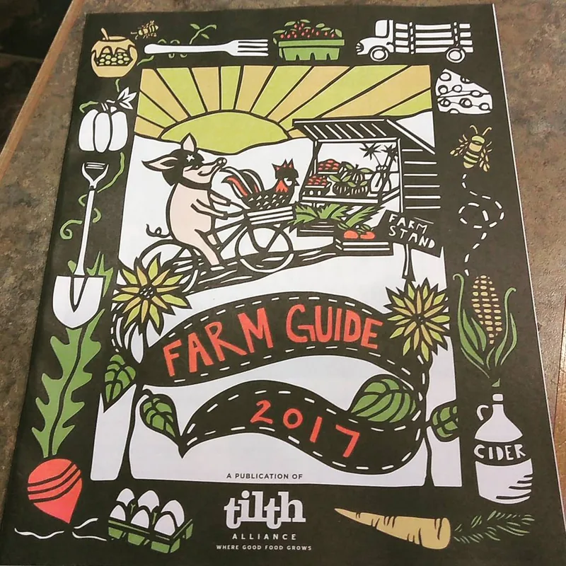A printed farm guide with an illustrated farm scene on its cover.
